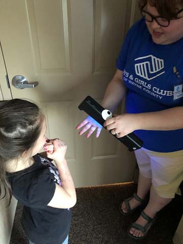 Supplied Photo: The Boys and Girls Club of Wayne County has used the Glitter Bug units to educate and improve children's understanding of handwashing. The unit is provided by the IU East School of Business and Economics.
